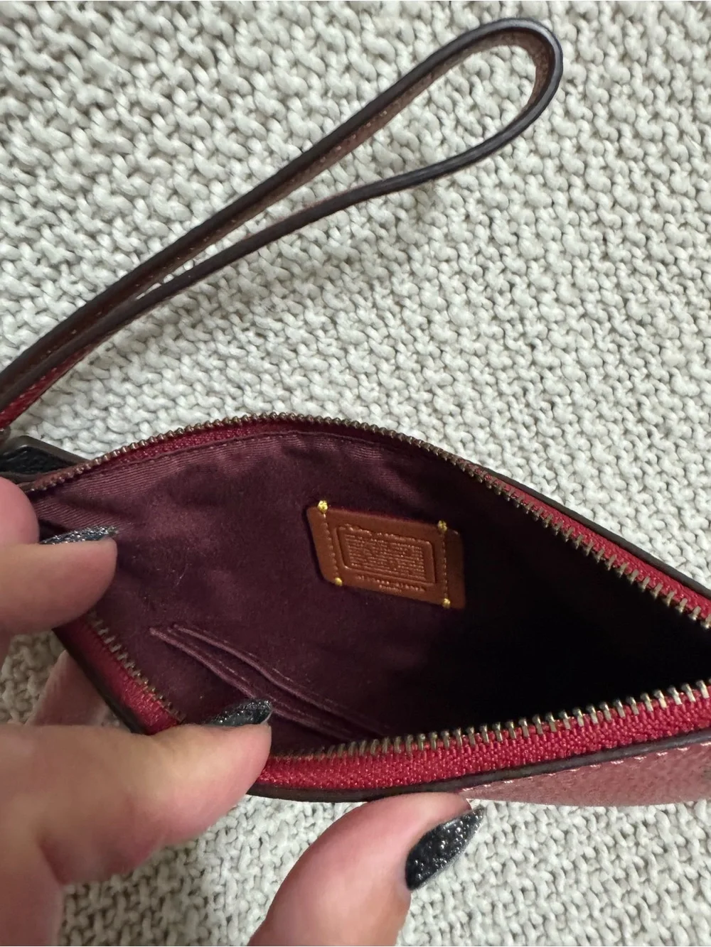 Coach Red Pebbled Leather Wristlet with Floral Emboss